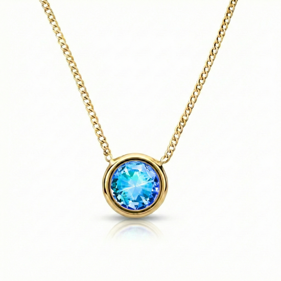  Halo Crystal Necklace, a stunning centerpiece in our Pendant collection that radiates pure elegance. This exquisite necklace showcases a dazzling 9mm blue crystal, durable 18k gold stainless with a 16"-18" adjustable chain.