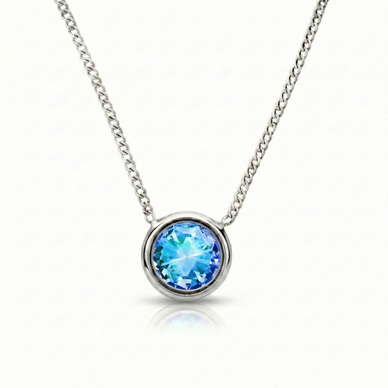  Halo Crystal Necklace, a stunning centerpiece in our Pendant collection that radiates pure elegance. This exquisite necklace showcases a dazzling 9mm blue crystal, durable stainless steel with a 16"-18" adjustable chain.