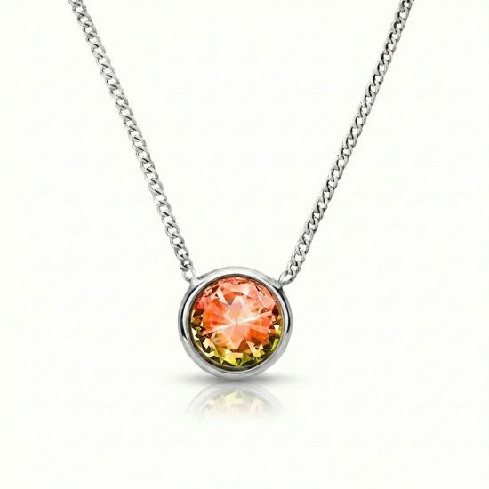  Halo Crystal Necklace, a stunning centerpiece in our Pendant collection that radiates pure elegance. This exquisite necklace showcases a dazzling 9mm fire crystal, durable stainless steel with a 16"-18" adjustable chain.