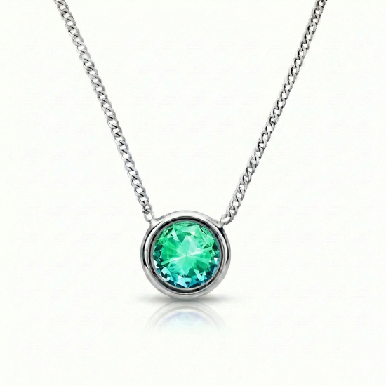  Halo Crystal Necklace, a stunning centerpiece in our Pendant collection that radiates pure elegance. This exquisite necklace showcases a dazzling 9mm green crystal, durable stainless steel with a 16"-18" adjustable chain.