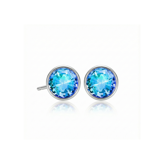 Pair of blue gemstone stud earrings on a white background