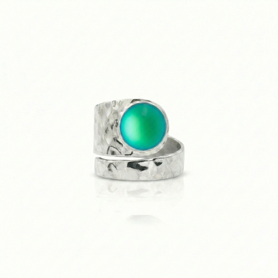 Hammered Single Circle Ring is made of .925 Sterling Silver, features a stunning frosted green crystal stone, and is adjustable.