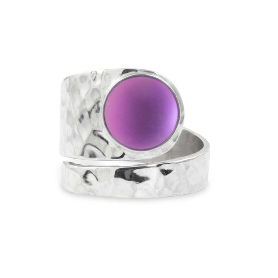 Hammered Single Circle Ring features a stunning crystal, frosted pink stone, and is adjustable. 