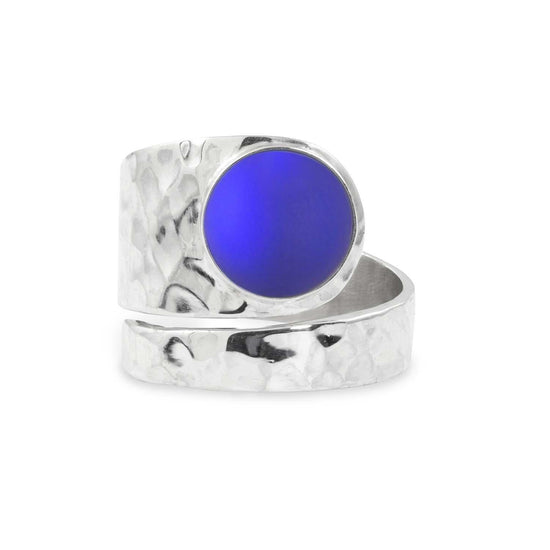 Hammered Single Circle Ring features a stunning crystal, frosted violet stone, and is adjustable. 