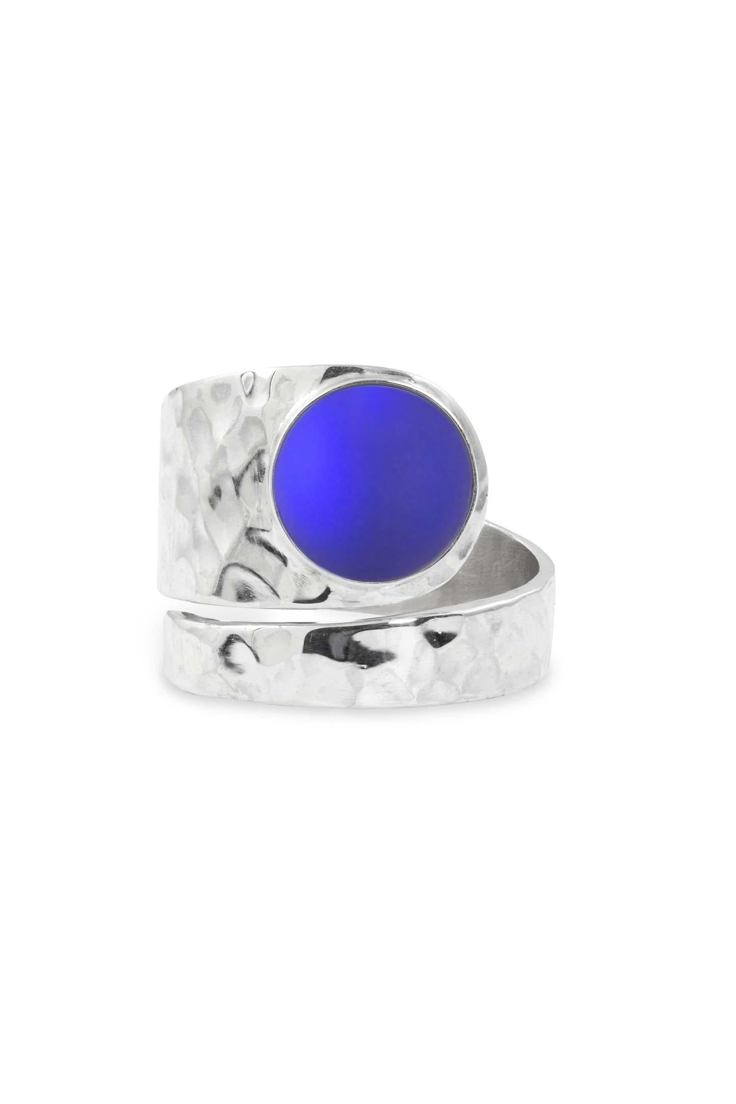 Hammered Single Circle Ring features a stunning crystal, frosted violet stone, and is adjustable. 