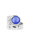 Hammered Single Circle Ring features a stunning crystal, polished violet stone, and is adjustable. 