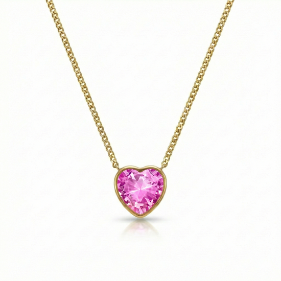 Heart Crystal Necklace with 18K gold stainless steel chain and an exquisite pendant features an intricate design with a radiant pink crystal centerpiece. 