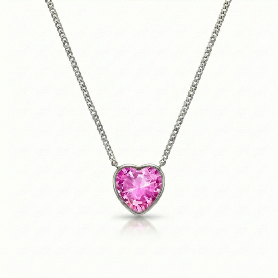 Heart Crystal Necklace with silver stainless steel chain and an exquisite pendant features an intricate design with a radiant pink crystal centerpiece. 