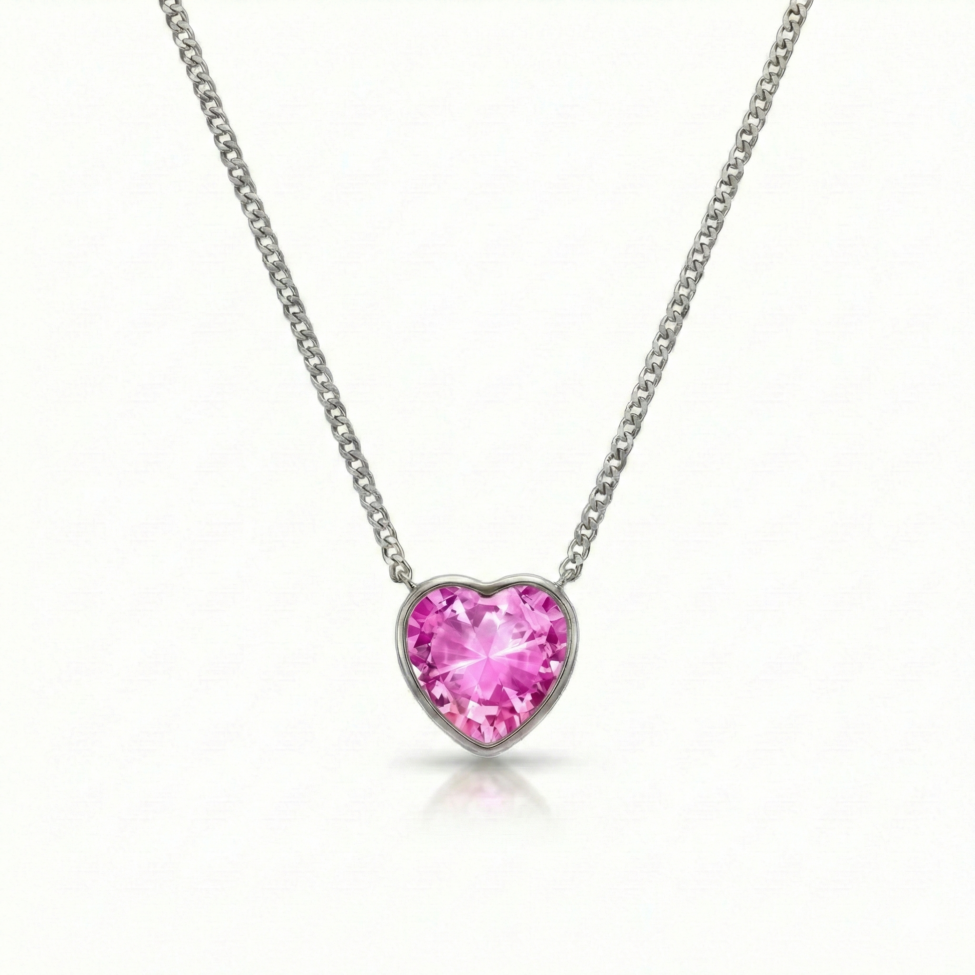 Heart Crystal Necklace with silver stainless steel chain and an exquisite pendant features an intricate design with a radiant pink crystal centerpiece. 