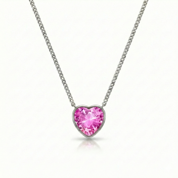 Heart Crystal Necklace with silver stainless steel chain and an exquisite pendant features an intricate design with a radiant pink crystal centerpiece. 