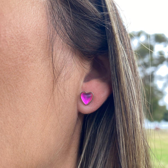 Heart Stud Earrings featuring a stunning 7mm frosted pink stone set in .925 sterling silver posts.