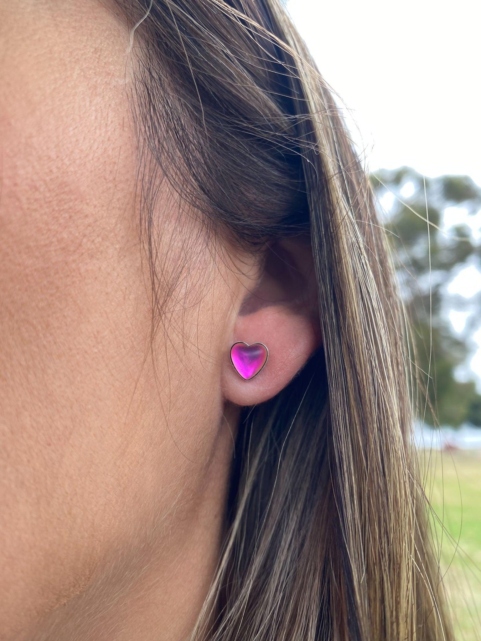 Heart Stud Earrings featuring a stunning 7mm frosted pink stone set in .925 sterling silver posts.