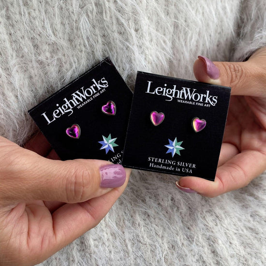 Heart Stud Earrings featuring a stunning 7mm polished pink stone set in .925 sterling silver posts.