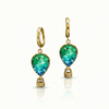 Gold earrings with green gemstones featuring delicate hot air balloon charms
