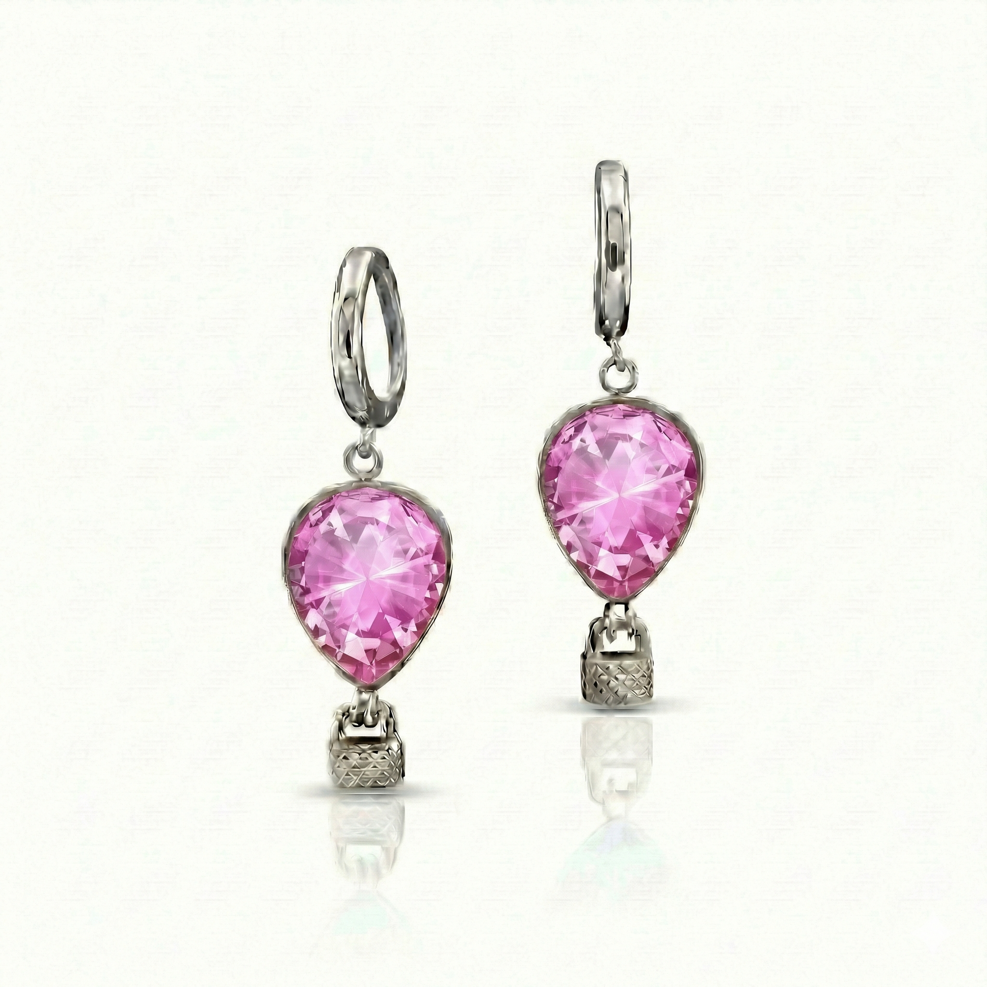 Pair of earrings with pink gemstones featuring delicate hot air balloon charms