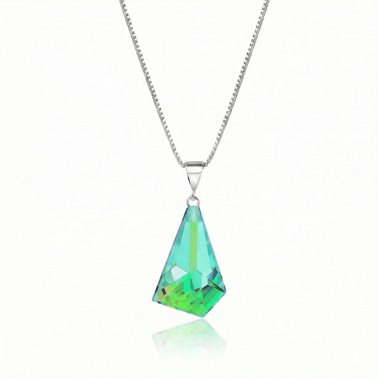  Iridescent Geometric Pendant Inspired by the unique form of sublime glaciers. Crafted with high-quality sterling silver components, this polished green stone pendant comes with an included 18" sterling silver .7mm box chain for a polished look.