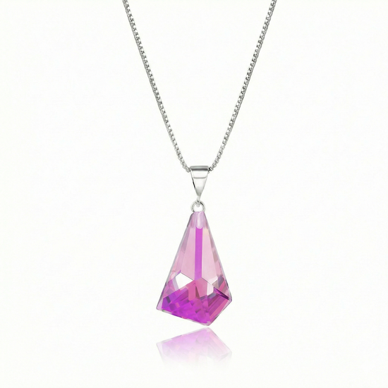  Iridescent Geometric Pendant Inspired by the unique form of sublime glaciers. Crafted with high-quality sterling silver components, this polished pink stone pendant comes with an included 18" sterling silver .7mm box chain for a polished look.