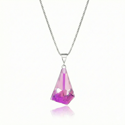  Iridescent Geometric Pendant Inspired by the unique form of sublime glaciers. Crafted with high-quality sterling silver components, this polished pink stone pendant comes with an included 18" sterling silver .7mm box chain for a polished look.