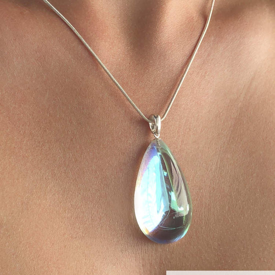 Large Drop Pendant comes with our best 1.2mm sterling silver snake chain, 18" long, with a polished green stone.