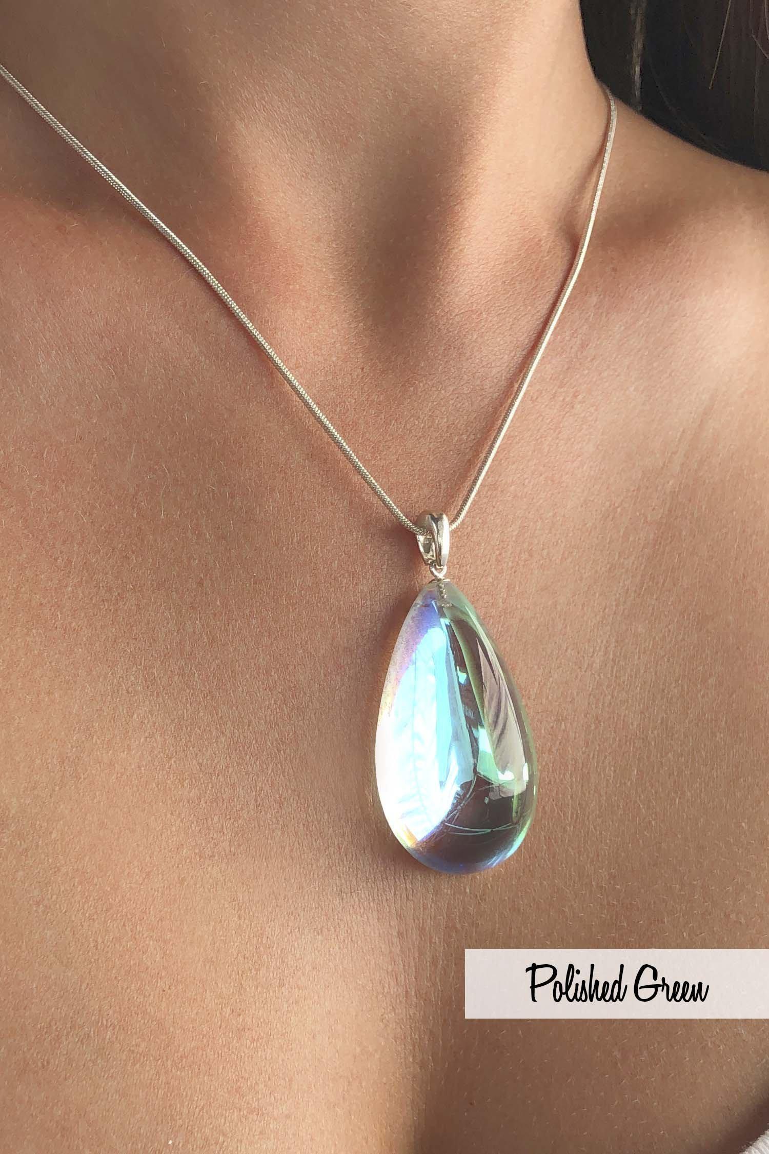 Large Drop Pendant comes with our best 1.2mm sterling silver snake chain, 18" long, with a polished green stone.