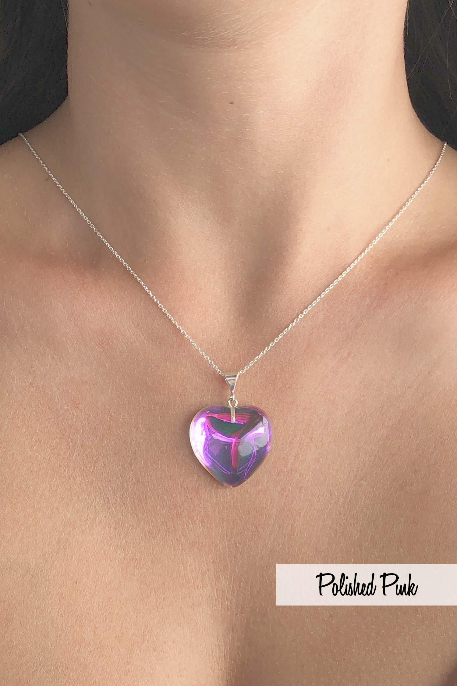Large Heart Pendant with .925 sterling silver components. It comes with Sterling silver .7mm box chain, 18" included with the polished pink pendant.