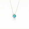 Large Sterling Silver Crystal Wave Pendant where it represents the "O" of Ocean Beach, while the surrounding silver symbolizes the "B." Crafted with .925 sterling silver components, the pendant comes with a 1mm sterling silver snake chain, 18" long with a polished aqua stone.
