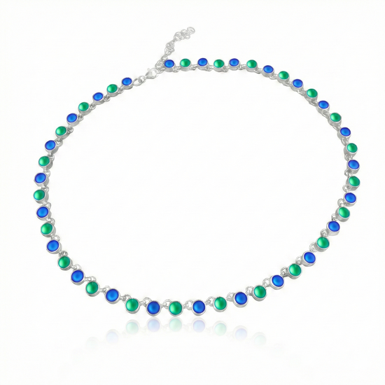 Luminous Crystal Circle Necklace, this beautiful piece is made from high-quality sterling silver and frosted blue and green crystals,  ensuring durability and lasting shine. Featuring a 16" choker with adjustable length, it offers a customizable fit for endless styling options.