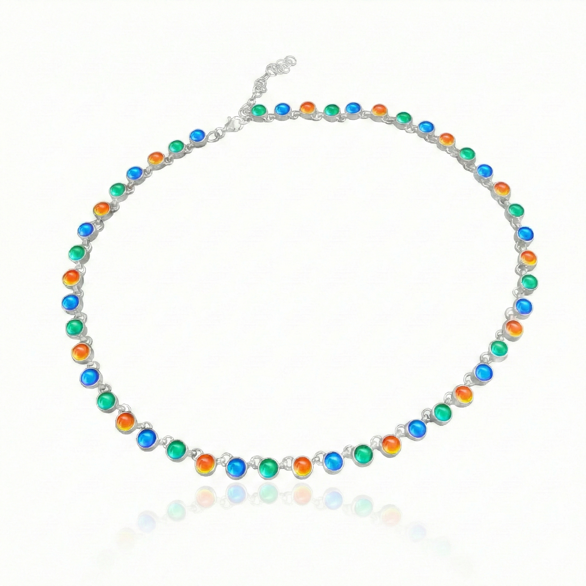 Luminous Crystal Circle Necklace, this beautiful piece is made from high-quality sterling silver and polished blue, green and fire crystals,  ensuring durability and lasting shine. Featuring a 16" choker with adjustable length, it offers a customizable fit for endless styling options.