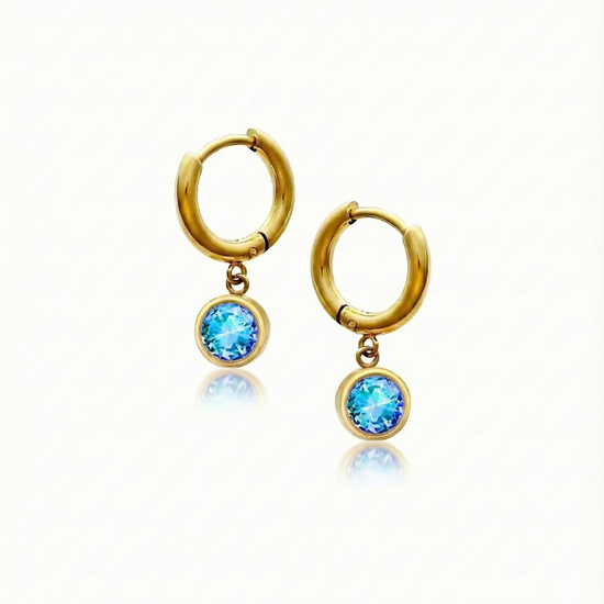 Lunar Hoop Earrings, these earrings feature dainty 5mm blue stone circles with 18k gold stainless steel.