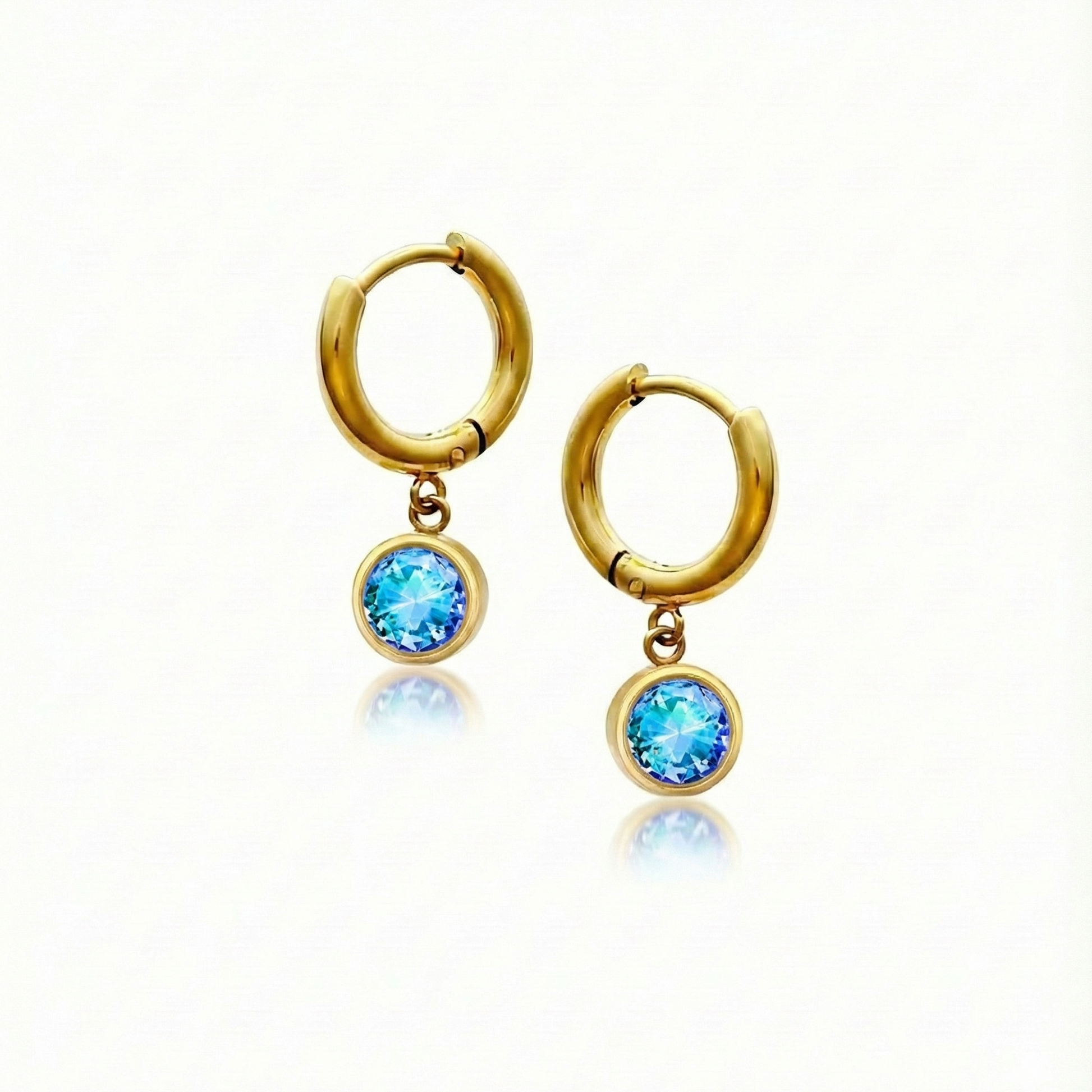 Lunar Hoop Earrings, these earrings feature dainty 5mm blue stone circles with 18k gold stainless steel.
