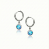 Lunar Hoop Earrings, these earrings feature dainty 5mm blue stone circles with silver stainless.