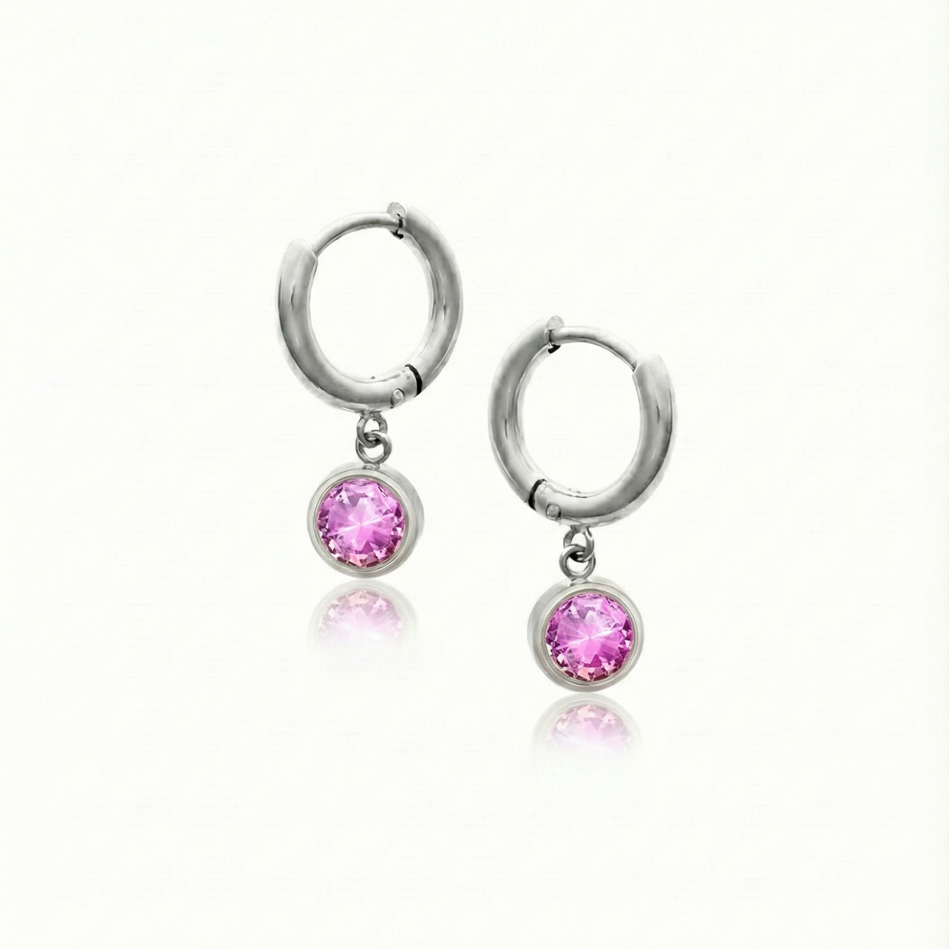 Lunar Hoop Earrings, these earrings feature dainty 5mm pink stone circles with silver stainless.