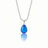 Medium Drop Pendant is a beautiful, simple, and elegant piece that includes an 18" sterling silver 1mm snake chain with the  frosted blue pendant.