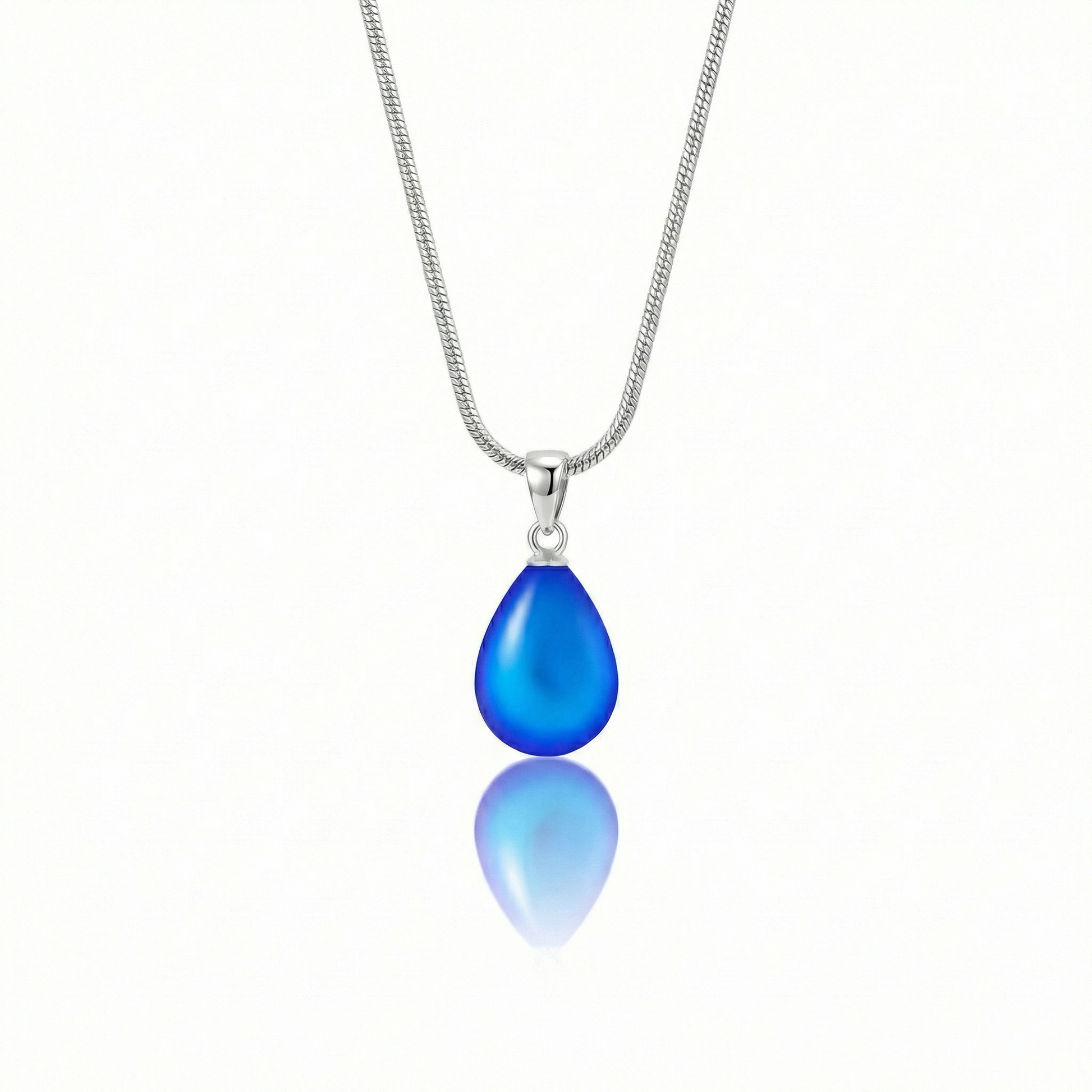 Medium Drop Pendant is a beautiful, simple, and elegant piece that includes an 18" sterling silver 1mm snake chain with the  frosted blue pendant.