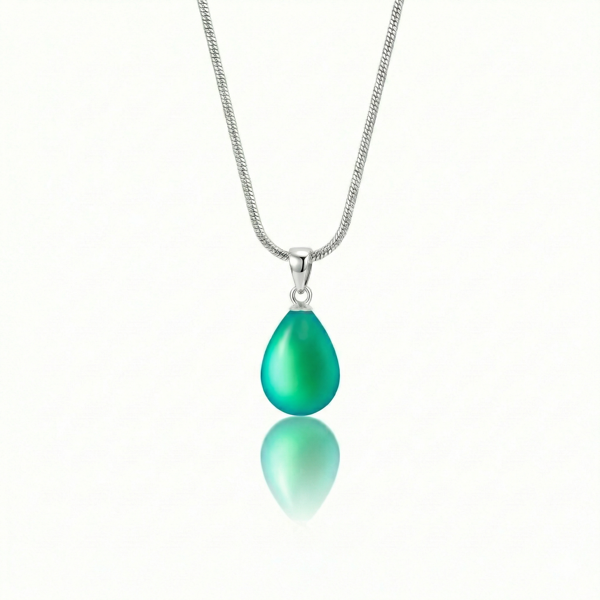 Medium Drop Pendant is a beautiful, simple, and elegant piece that includes an 18" sterling silver 1mm snake chain with the frosted green pendant.
