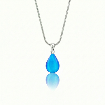 Medium Drop Pendant is a beautiful, simple, and elegant piece that includes an 18" sterling silver 1mm snake chain with the  polished blue pendant.