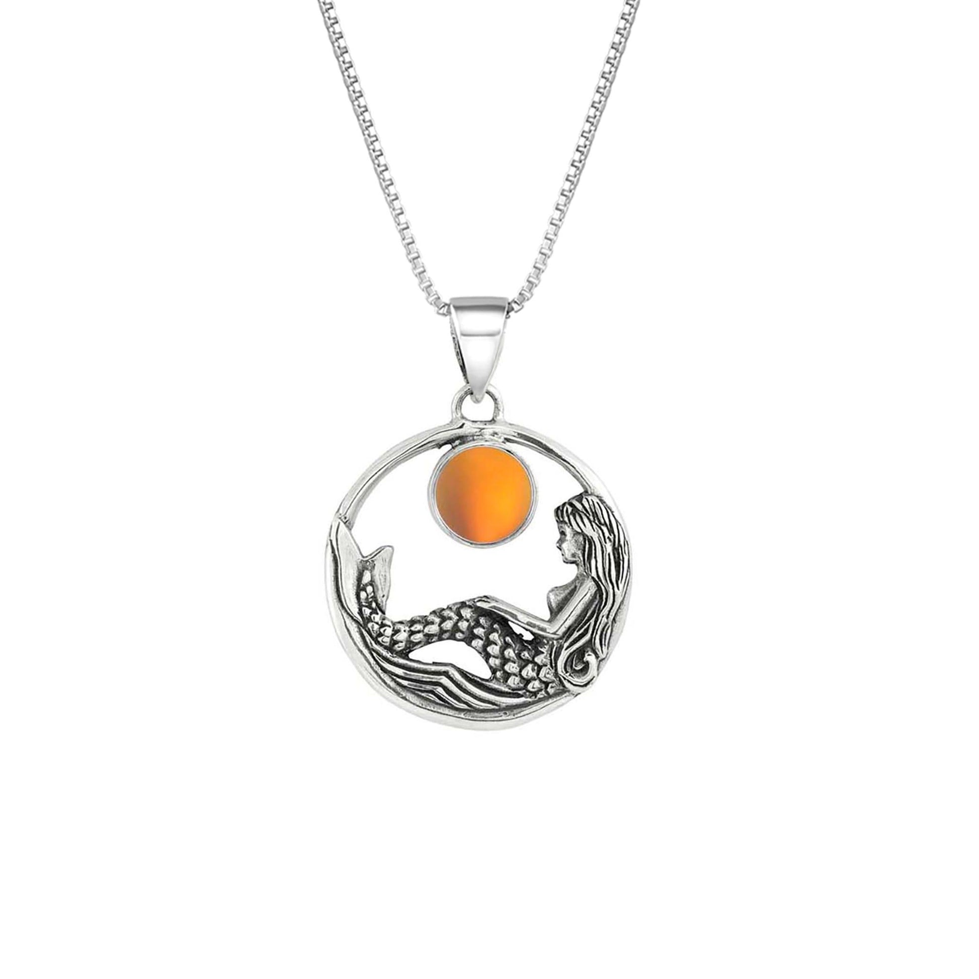Mermaid Pendant features a beautiful mermaid sitting gracefully beneath a stunning 9mm glowing, frosted fire crystal. The pendant comes with an 18" sterling silver .7mm box chain included.