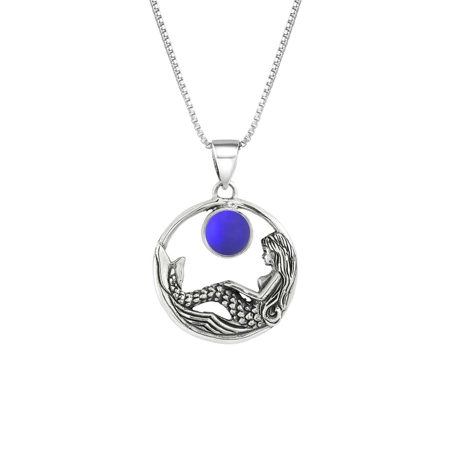 Mermaid Pendant features a beautiful mermaid sitting gracefully beneath a stunning 9mm glowing, frosted violet crystal. The pendant comes with an 18" sterling silver .7mm box chain included.