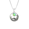 Mermaid Pendant features a beautiful mermaid sitting gracefully beneath a stunning 9mm glowing, polished green crystal. The pendant comes with an 18" sterling silver .7mm box chain included.
