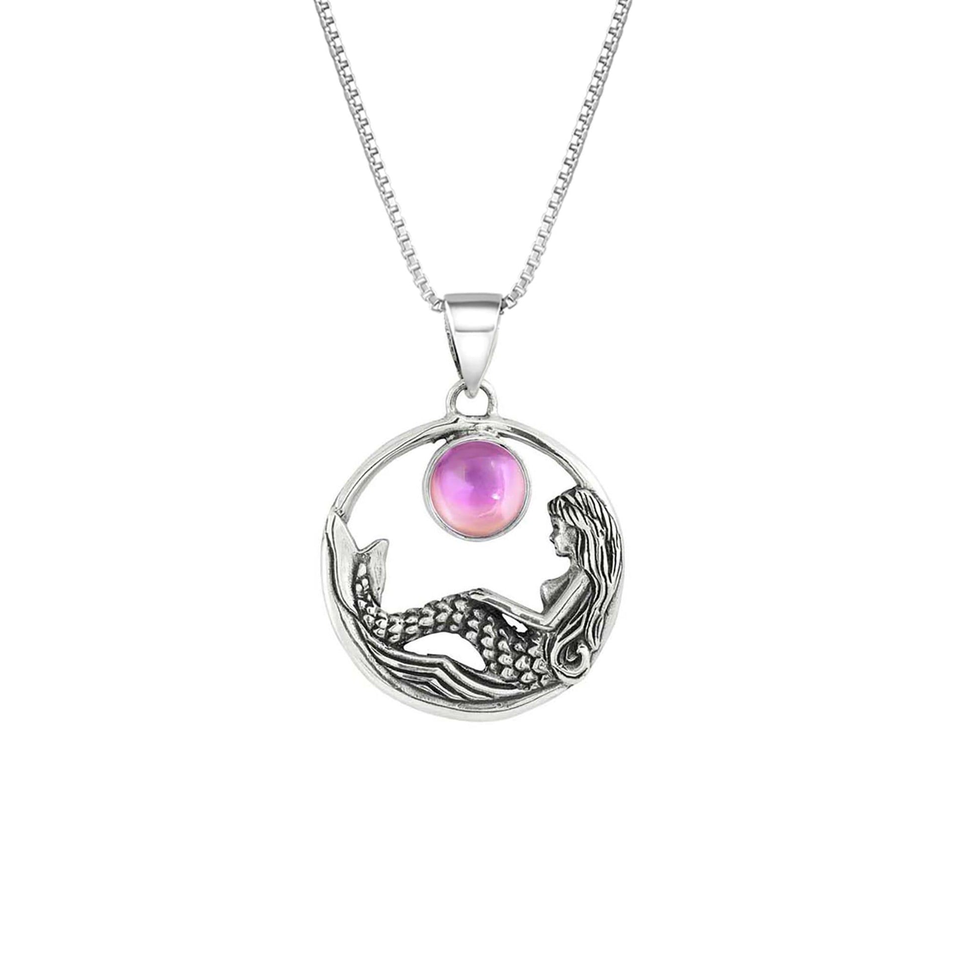 Mermaid Pendant features a beautiful mermaid sitting gracefully beneath a stunning 9mm glowing, polished pink crystal. The pendant comes with an 18" sterling silver .7mm box chain included.
