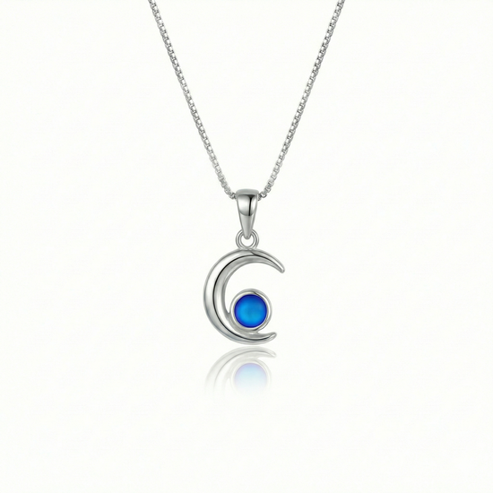 Moon Pendant crafted from high-quality materials, comes with an 18" sterling silver  chain and 5mm frosted blue stone.
