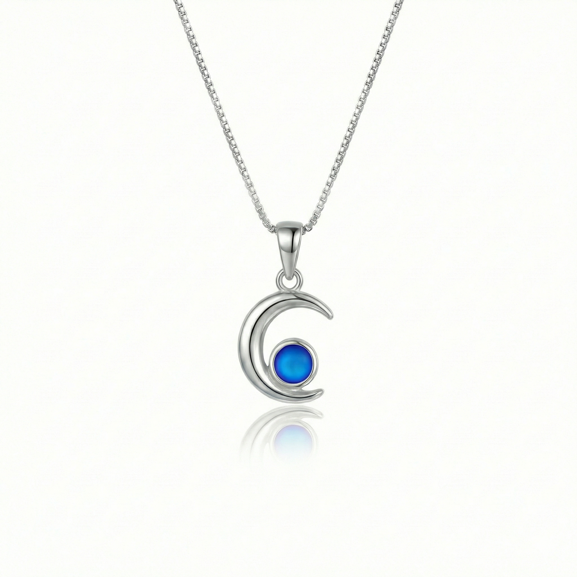 Moon Pendant crafted from high-quality materials, comes with an 18" sterling silver  chain and 5mm frosted blue stone.
