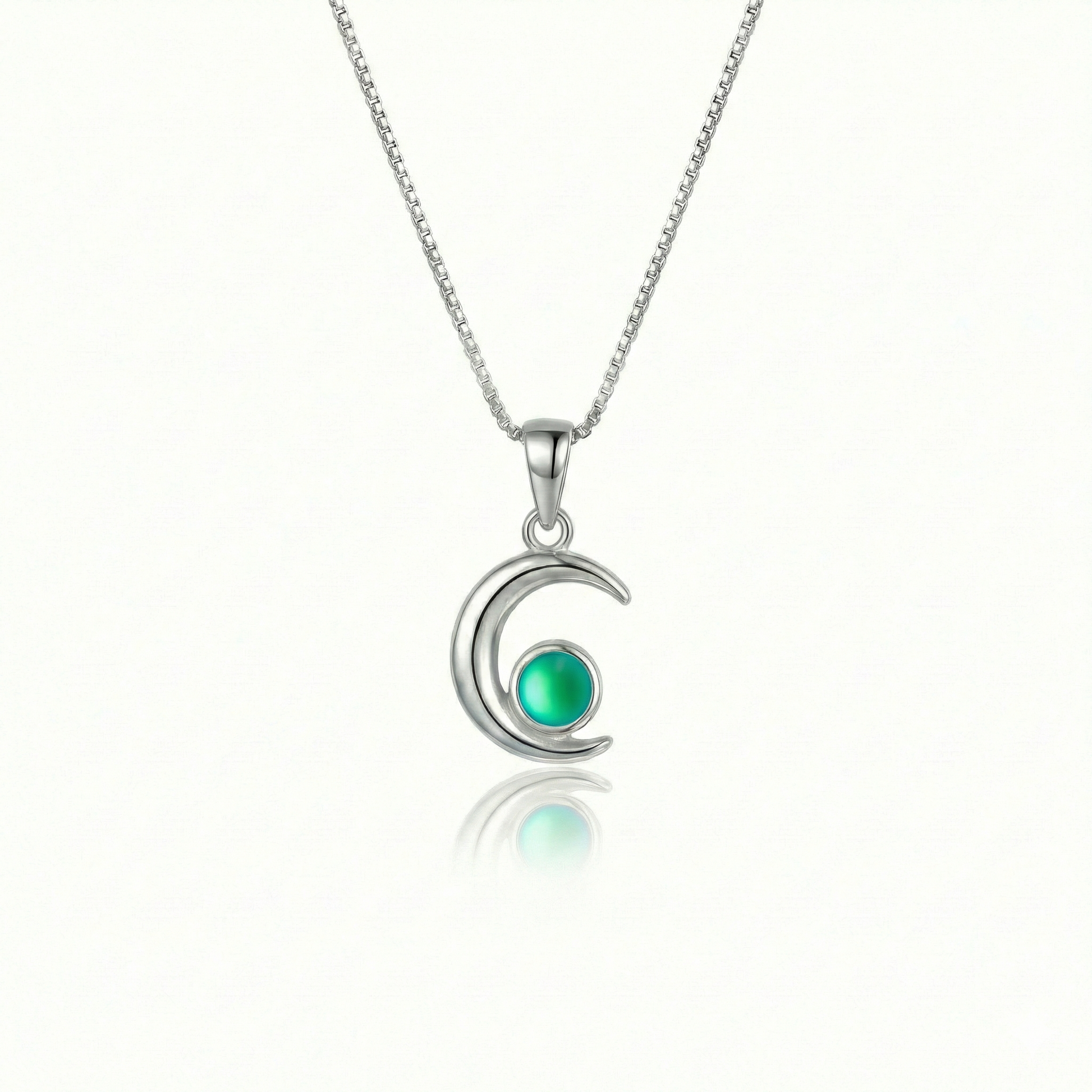 Moon Pendant crafted from high-quality materials, comes with an 18" sterling silver  chain and 5mm frosted green stone.