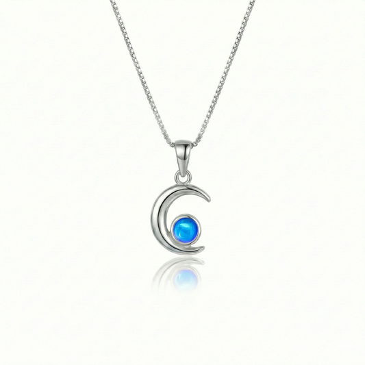 Moon Pendant crafted from high-quality materials, comes with an 18" sterling silver  chain and 5mm polished blue stone.