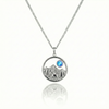 Silver necklace with a moose, mountain, and blue gem pendant.