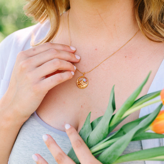Featuring a waterproof, durable construction that laughs in the face of splashes and scratches, this piece is built for real life—not just special occasions. The adjustable 16"-18" chain lets you find your perfect fit, whether you're summiting peaks or just summiting your daily to-do list. Wear it proud, wear it tough.