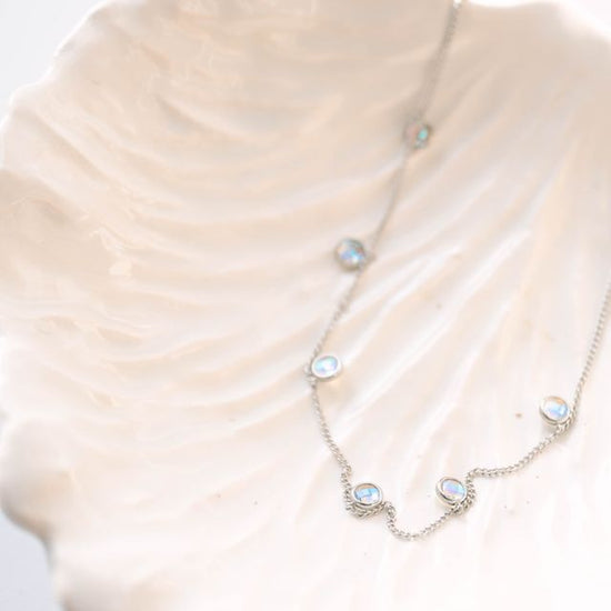 5mm stones arranged in a harmonious multi-stone composition, this necklace balances presence with refinement. The adjustable 16-18" chain provides flexibility to suit your preferred drape and neckline, while the precisely proportioned stones deliver elegant sparkle without excess. 