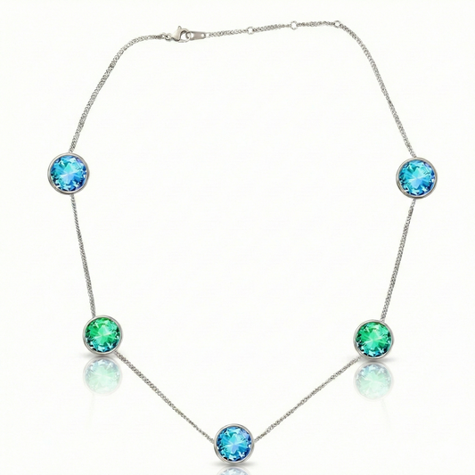 Multi Stone features 9mm multi-colored stones set in a reversible design with an adjustable 16"-18" silver stainless chain, 9mm round blue and green stones.