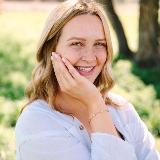 This versatile bracelet features six reversible 5mm stones set in 18k gold PVD-coated stainless steel, offering sophisticated styling flexibility with every wear. 