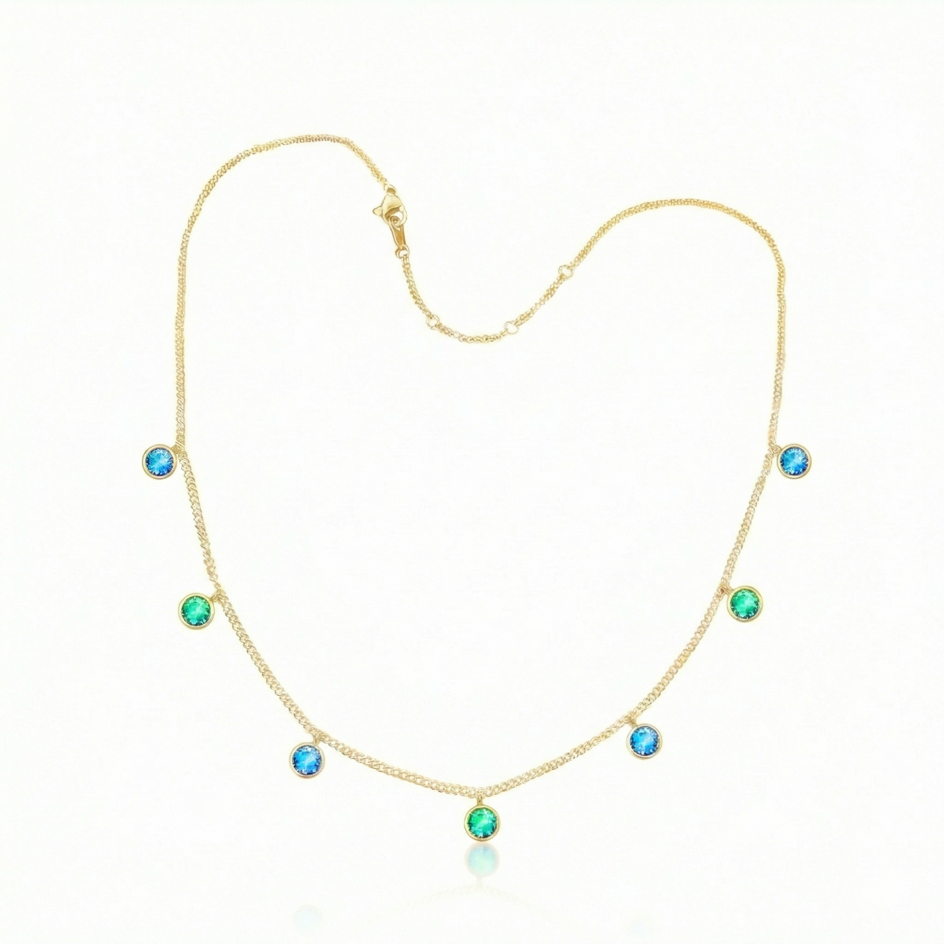 Multi Stone Necklace featuring radiant 5mm blue/green stones arranged in a harmonious multi-stone composition. The adjustable 16-18" gold chain provides flexibility to suit your preferred drape and neckline. Crafted for those who appreciate quality materials and thoughtful design. 